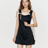 Kroche 2508 立体蝴蝶撞色缎面A摆连衣裙 黑