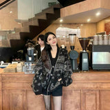 DIANA VEVINA 链条图腾毛衣开衫 黑