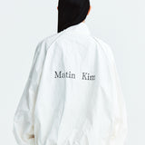 MATIN KIM 2603 LOGO COATING JUMPER IN WHITE