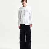 MATIN KIM 2603 ASYMMETRIC LOGO TOP IN WHITE