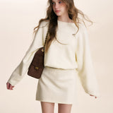 Kroche 2601 斜肩蝙蝠长袖针织A字短款收腰连衣裙