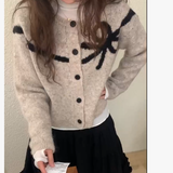 KOREAN COLLECTION 2511 蝴蝶结印花毛衣开衫 燕麦